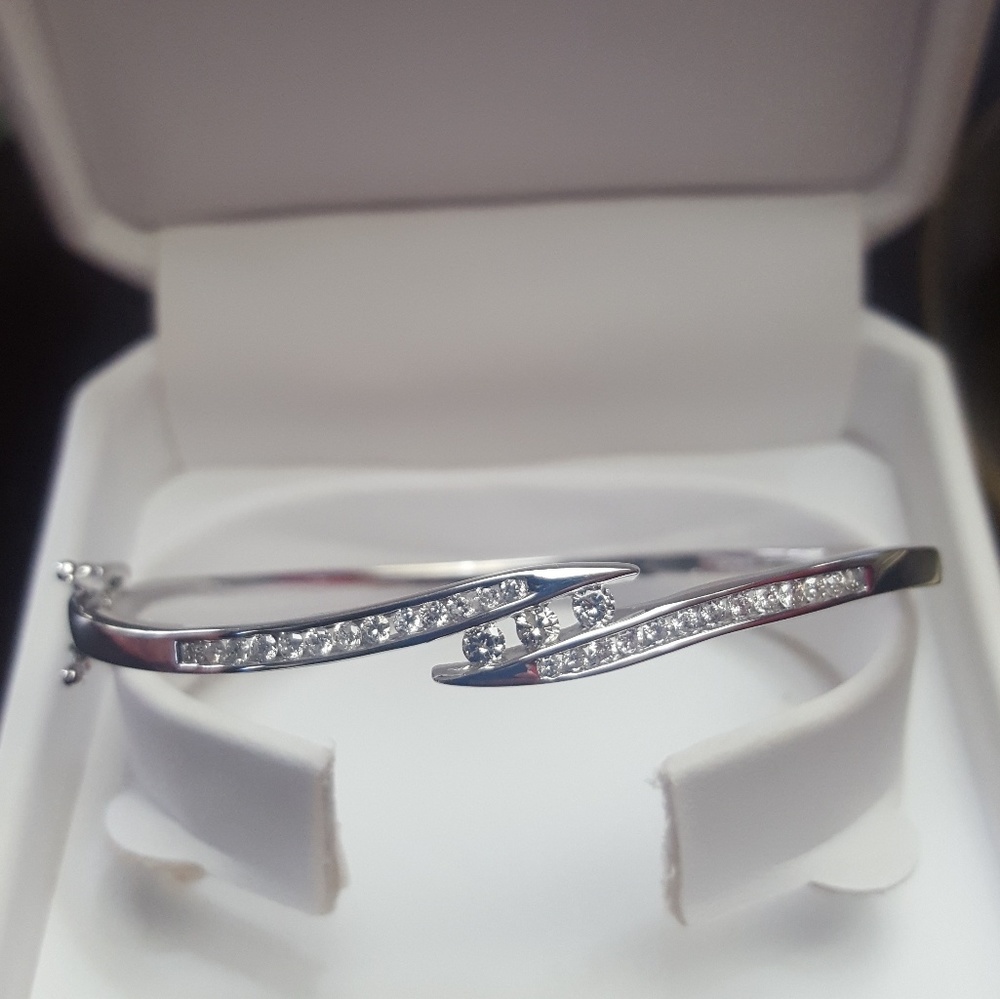 Woman bracelet 14 carat wh gold, 1 car diamonds